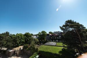 an aerial view of a house with a yard at Apart residences by the sea in Palanga