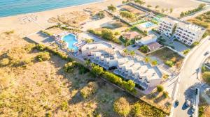 an aerial view of a resort on the beach at Akti Corali Hotel in Amoudara Herakliou