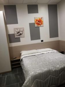 Postel nebo postele na pokoji v ubytování B&B Adriatico