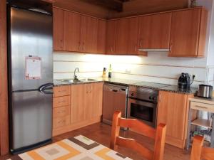 A kitchen or kitchenette at Apartamento Mirador Del Puigmal