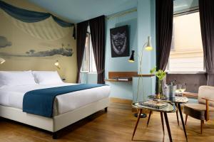 Posteľ alebo postele v izbe v ubytovaní Hotel De' Ricci - Small Luxury Hotels of the World