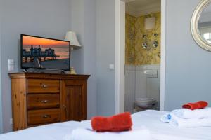 Postel nebo postele na pokoji v ubytování Villa Hansa Binz App 4 am Kurpark Meine Ferienzeit