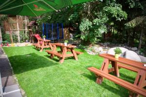 Vonkajšia záhrada v ubytovaní Holiday's Apartment Jasná