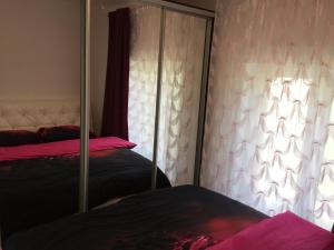 Postel nebo postele na pokoji v ubytování Guest House