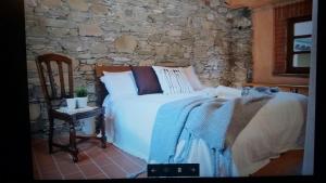 Posteľ alebo postele v izbe v ubytovaní La cascina di Anna