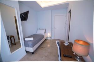 Posteľ alebo postele v izbe v ubytovaní B&B Attico 33