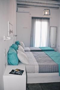Ένα ή περισσότερα κρεβάτια σε δωμάτιο στο The Goat House