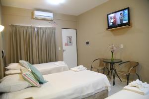 Katil atau katil-katil dalam bilik di Arthur Palace Hotel