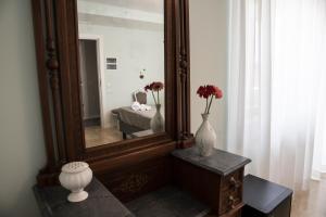 Posteľ alebo postele v izbe v ubytovaní B&B Attico 33