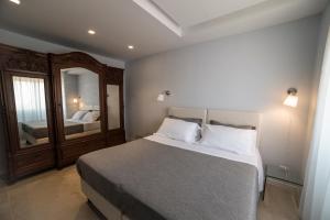 Posteľ alebo postele v izbe v ubytovaní B&B Attico 33