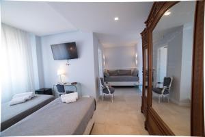 Posteľ alebo postele v izbe v ubytovaní B&B Attico 33