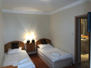 Posteľ alebo postele v izbe v ubytovaní Luxus Golf Apartment