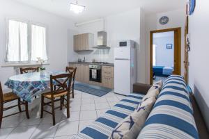A kitchen or kitchenette at Residence Kimba