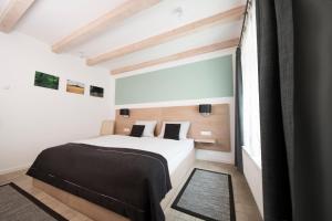 Postel nebo postele na pokoji v ubytování Altes Eishaus, Hotel & Restaurant