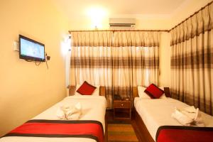 Posteľ alebo postele v izbe v ubytovaní Hotel Atlantic