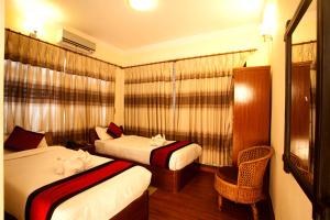 Posteľ alebo postele v izbe v ubytovaní Hotel Atlantic