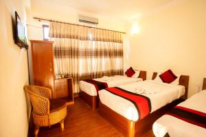 Posteľ alebo postele v izbe v ubytovaní Hotel Atlantic