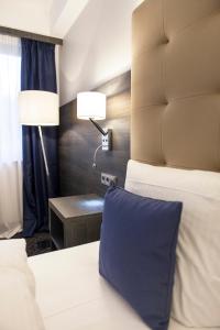 Ein Bett oder Betten in einem Zimmer der Unterkunft Messehotel Europe