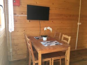 TV a/nebo společenská místnost v ubytování Kayman