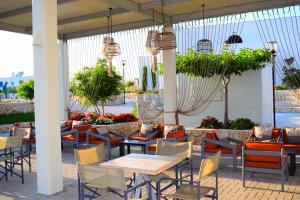 Restauracja lub miejsce do jedzenia w obiekcie Skiros Palace Hotel
