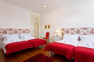 Posteľ alebo postele v izbe v ubytovaní Casa Portugueza Experience