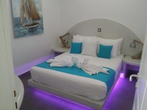 Posteľ alebo postele v izbe v ubytovaní Santoxenia luxury villa