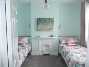 Postel nebo postele na pokoji v ubytování Cornerstone