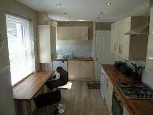Kuchyň nebo kuchyňský kout v ubytování Cornerstone + 4 fotografie