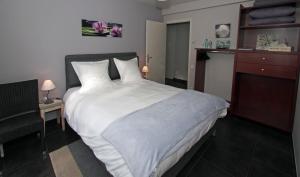 Ένα ή περισσότερα κρεβάτια σε δωμάτιο στο Villa Kernéhan