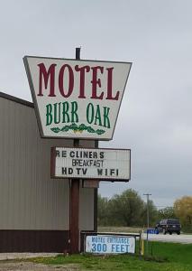 a motel sign for a motel buff oat at Burr Oak Motel in Algona