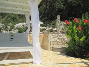 Vonkajšia záhrada v ubytovaní Relax tiny villas 40 meters of the beach