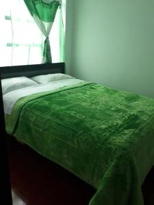 Rúm í herbergi á Hotel Royal Class