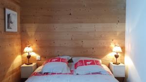 מיטה או מיטות בחדר ב-Chez Liadet