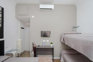 Postel nebo postele na pokoji v ubytování Re di Luna B&B