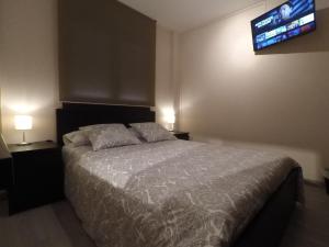 Postel nebo postele na pokoji v ubytování Casa Carol