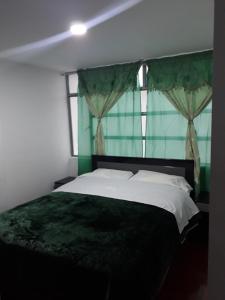 Rúm í herbergi á Hotel Royal Class