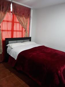 Rúm í herbergi á Hotel Royal Class