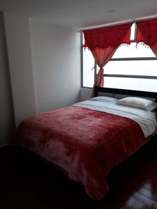Rúm í herbergi á Hotel Royal Class