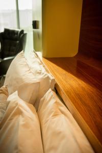 Cama ou camas em um quarto em Ohtel Wellington