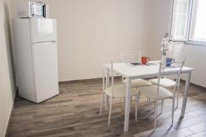 Kuchyň nebo kuchyňský kout v ubytování Un posto al sole