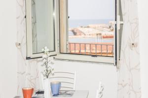 Balkón nebo terasa v ubytování Un posto al sole