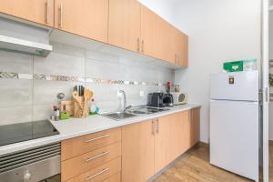 Dapur atau dapur kecil di Faro Cosy Guesthouse