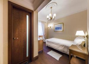 Postel nebo postele na pokoji v ubytování Phi Hotel Principe + 37 fotografií