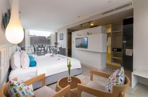 TV a/nebo společenská místnost v ubytování Damrei Residence & Spa