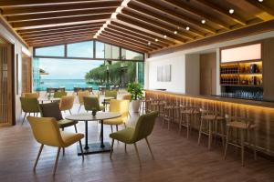 Ein Sitzbereich in der Unterkunft Dusit Princess Moonrise Beach Resort
