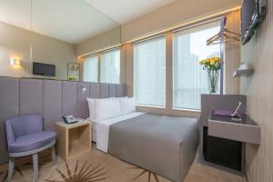 TV a/nebo společenská místnost v ubytování Silka Far East Hotel
