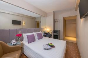 TV a/nebo společenská místnost v ubytování Silka Far East Hotel