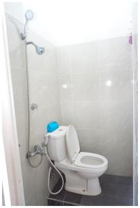 Ein Badezimmer in der Unterkunft Budi House & Food Station