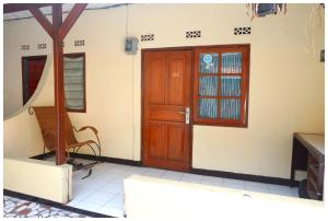 Ein Sitzbereich in der Unterkunft Budi House & Food Station