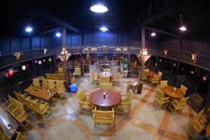 an overhead view of a restaurant with tables and chairs at KMA SHWE PYI BAGO Resort in Bago